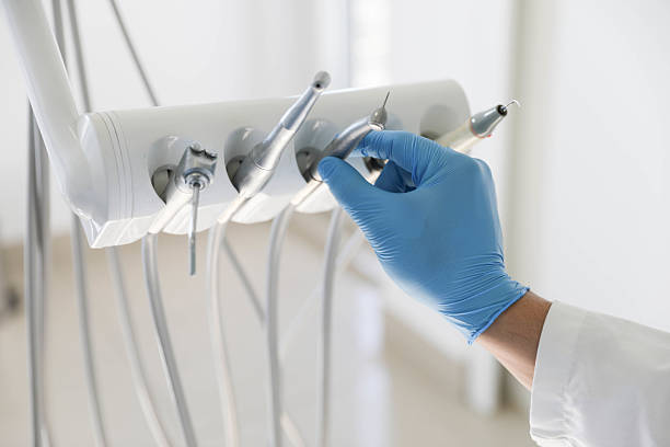 Professional Tooth Extraction technician working in Oakes, ND